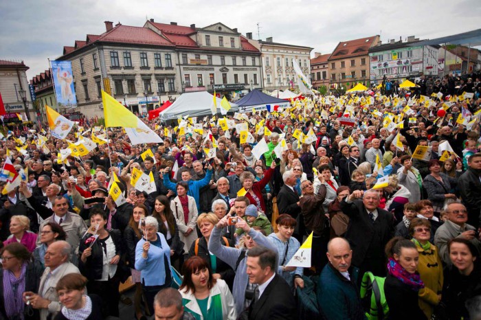 Catholic faithful celebrate the canonisation of Pope John XXIII and John Paul II, in Wadowice