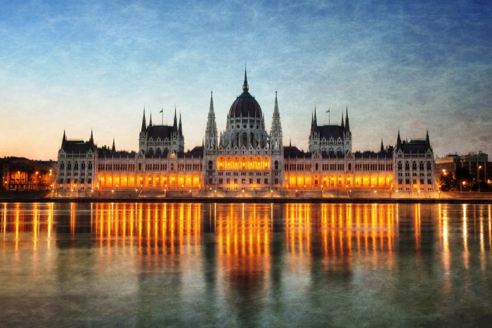 Sunrise behind the Hungarian Parliament building in Budapest.